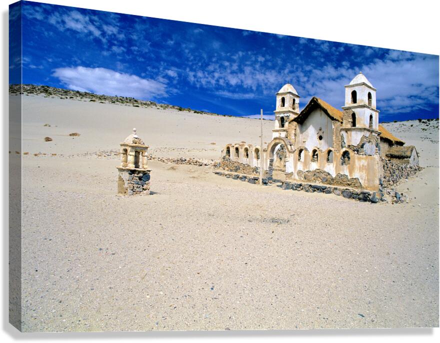 Old church ruins in a desolate sandy landscape. Canvas Print