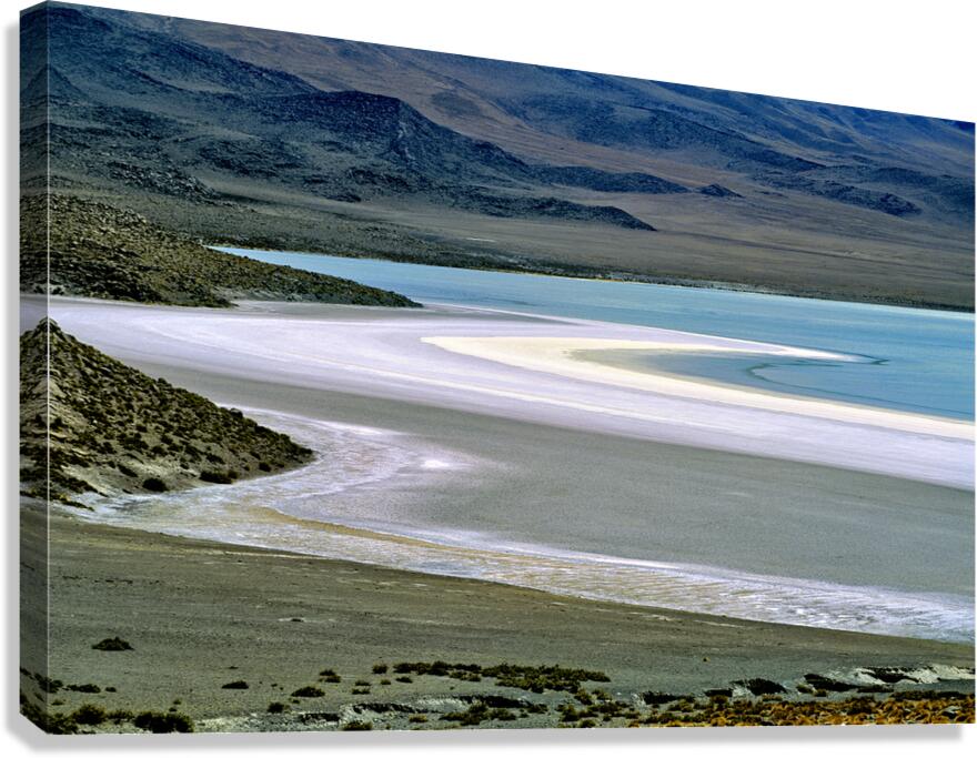 Scenic desert lake with white shore and rocky mountains. Canvas Print