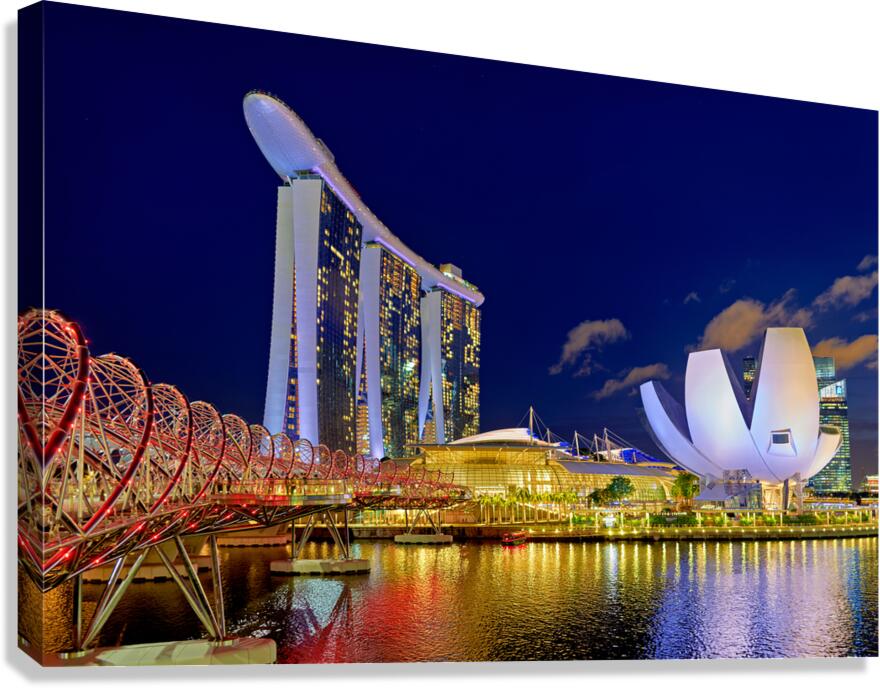 Sunset at marina bay sands artscience museum and helix bridge Canvas Print