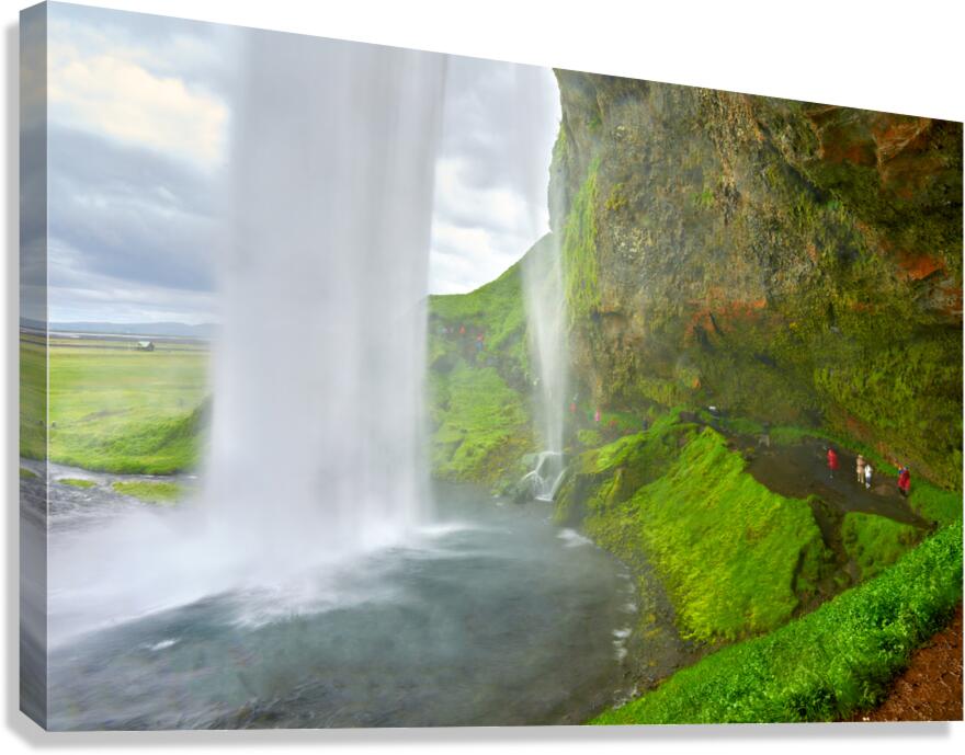 Seljalandsfoss waterfall view from behind in Iceland Canvas Print