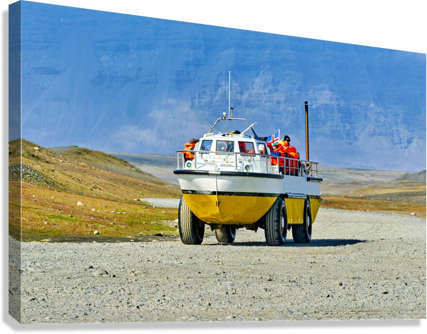 Exploring Jokulsarlon Glacier Lagoon with amphibian vehicle Canvas Print