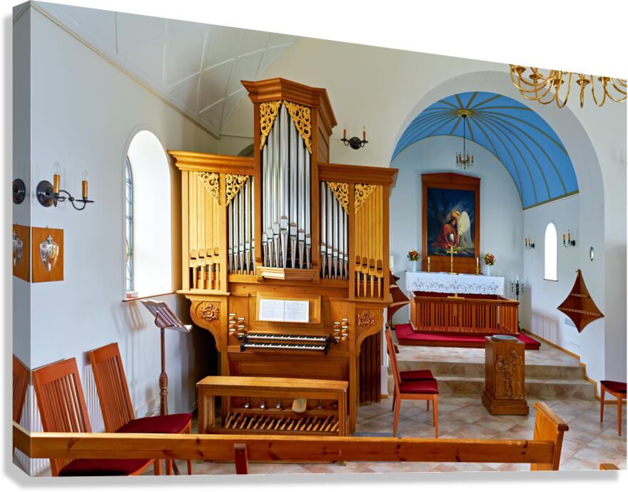 Wooden church interior with organ in Vik i Myrdal Iceland Canvas Print