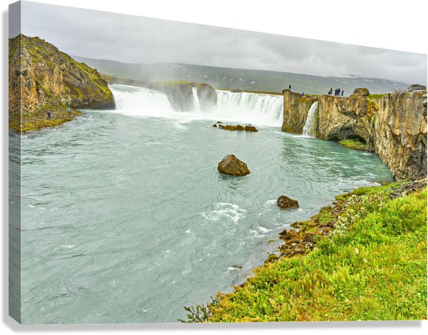 Exploring Godafoss waterfall in Iceland on a cloudy day Canvas Print