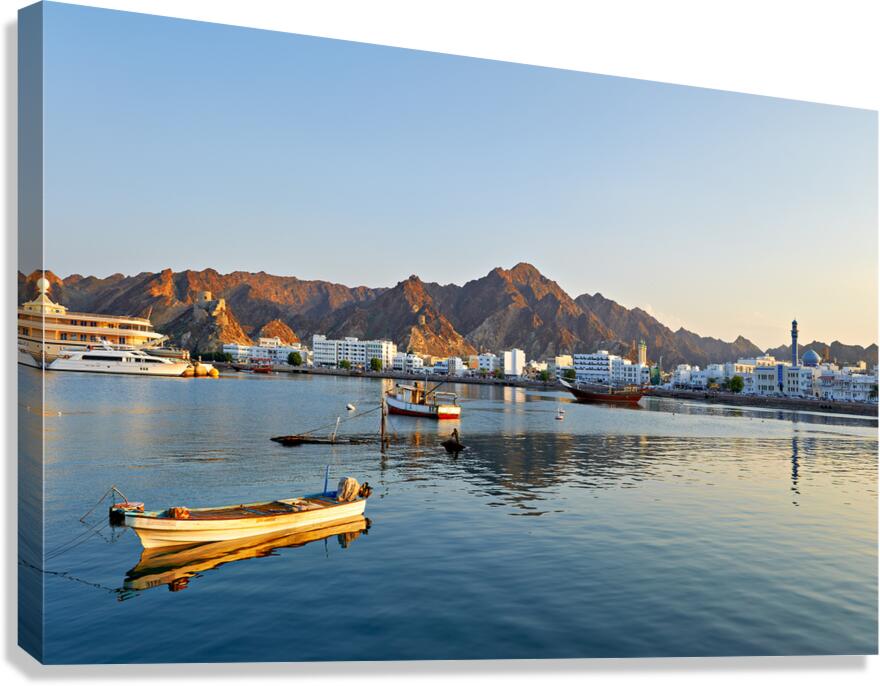 Waterfront view in Muscat Oman at sunset near boats Canvas Print