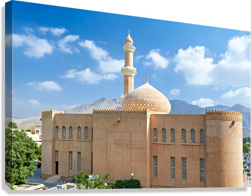 Nizwa Fort view with mountains and clouds in Oman Canvas Print