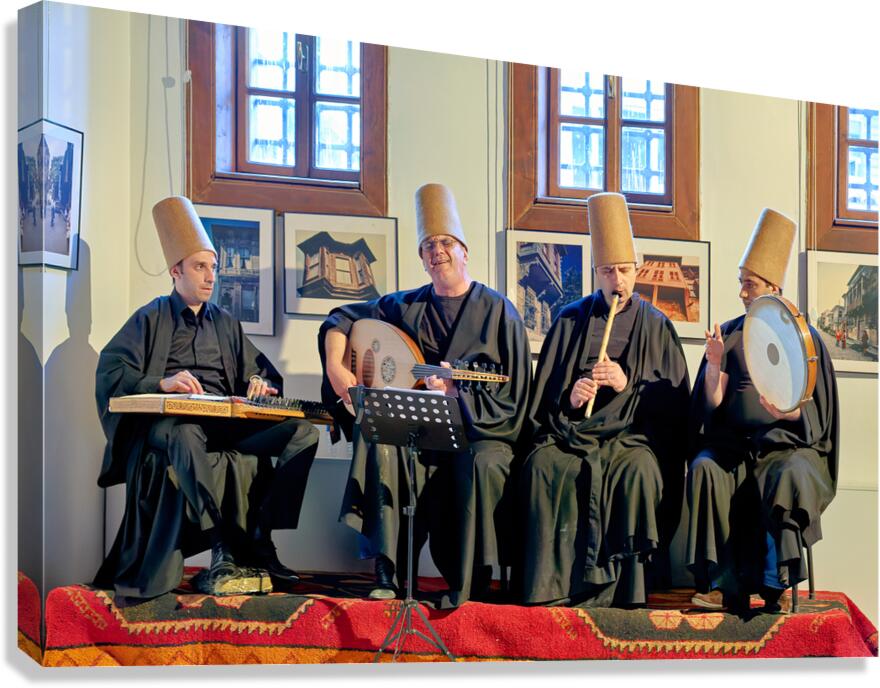 Dervishes perform in Istanbul at a Sufi event Canvas Print