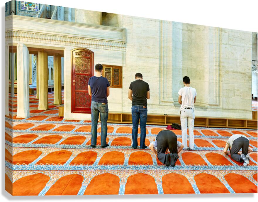 People pray inside Suleymaniye Mosque in Istanbul Turkey Canvas Print
