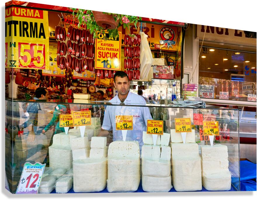 Cheese vendor at Grand Bazaar in Istanbul during busy hours Canvas Print