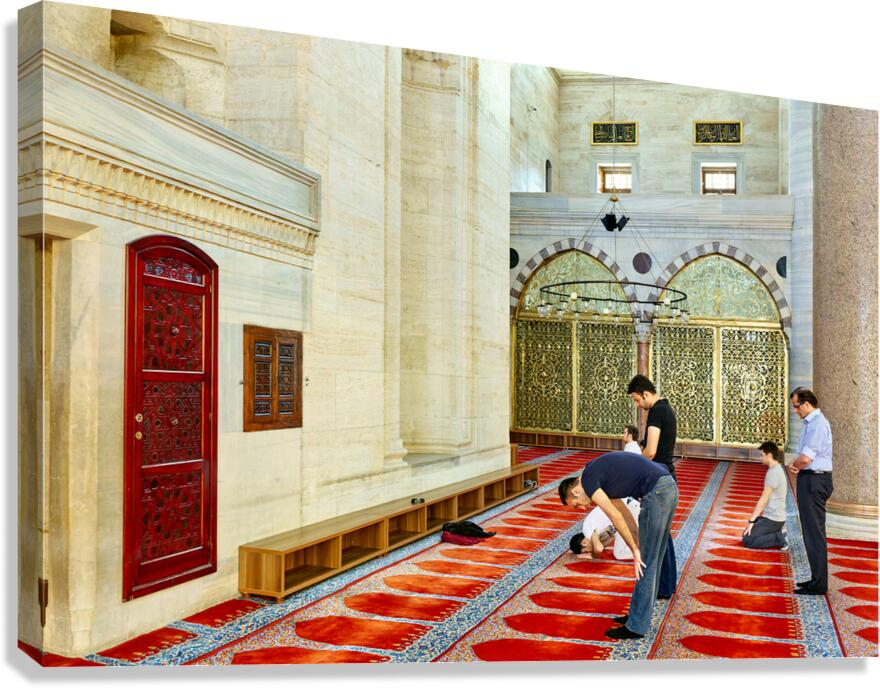 People pray inside Suleymaniye Mosque in Istanbul Turkey Canvas Print