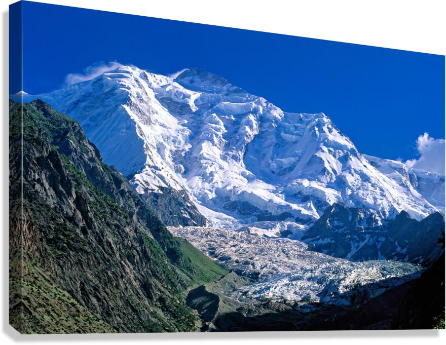 Karakoram range shows snow capped peaks and rocky terrain Canvas Print