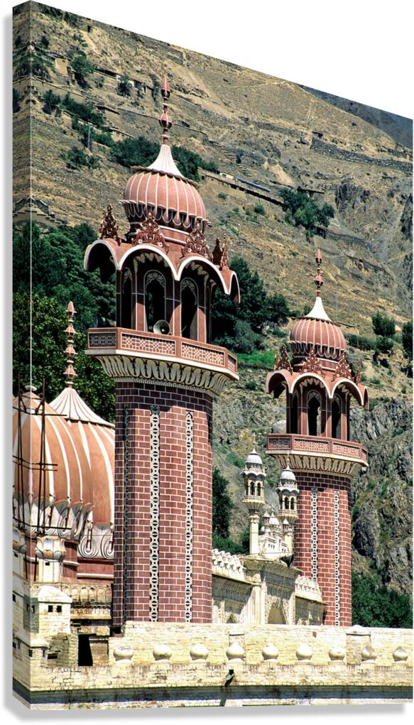 Mosque towers stand tall in Chitral Pakistan on a clear day Canvas Print
