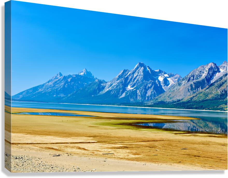 Mountains reflect in the water at Grand Teton National Park Canvas Print