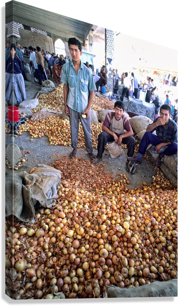 Young vendors sell onions in a market in Khiva Uzbekistan Canvas Print