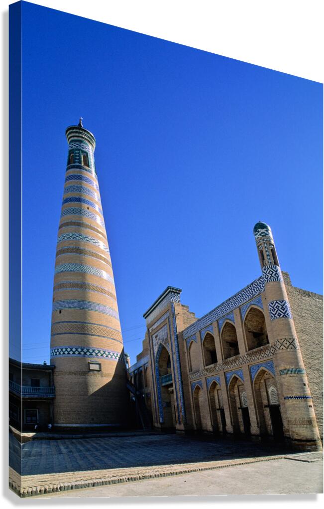 Explore Khivas historic minaret and architecture Canvas Print