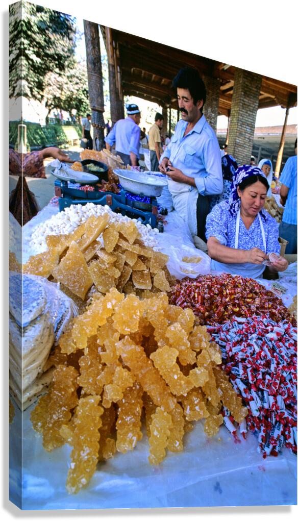 Cooks prepare sweets at a market in Samarkand Uzbekistan Canvas Print