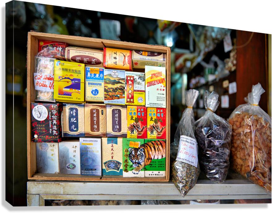 Variety of herbal products and packaging in Hanoi market Canvas Print
