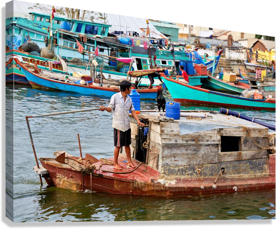 Fishing boat on water in Phu Quoc Vietnam during the day Canvas Print