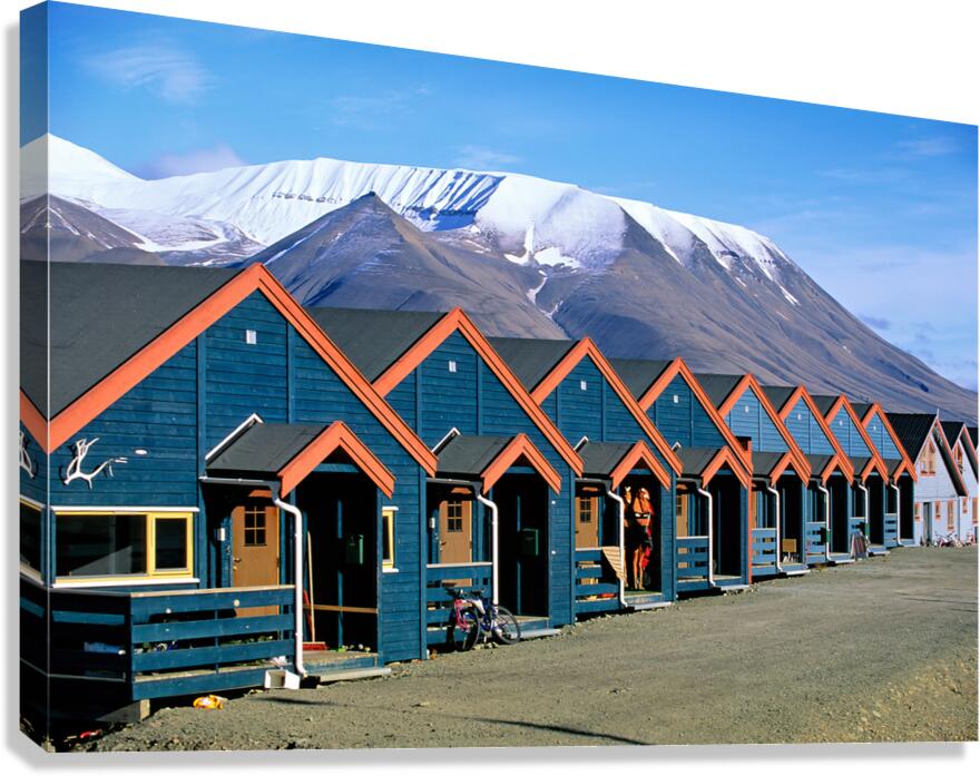 Colorful houses line the street in Longyearbyen Svalbard Canvas Print
