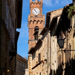 Town hall and clock tower in Pienza Val dOrcia Tuscany