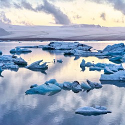 Midnight at jokulsarlon glacier lagoon in iceland
