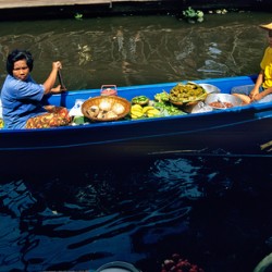 Discover food and veggies at Bangkoks floating market