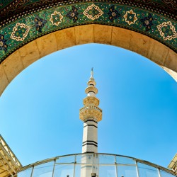 Minaret in Damascus Syria under clear blue sky