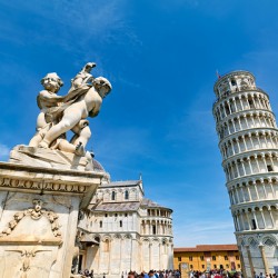 Leaning Tower and Fountain of Angels in Piazza dei Miracoli