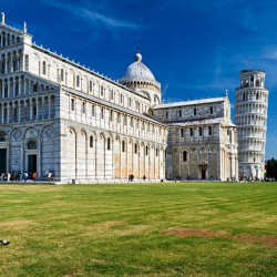 Pisa in Tuscany Italy shows Cathedral and Leaning Tower