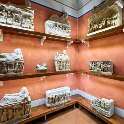 Exploring cinerary urns at Guarnacci Museum in Volterra