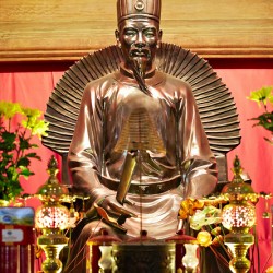Statue of a historic figure in Hanoi Vietnam during the day