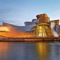 Guggenheim Museum shines at night in Bilbao Spain