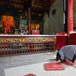 Worshippers at a temple in Ho Chi Minh Vietnam
