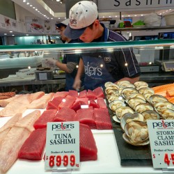 Fresh sashimi and seafood displayed at Peters Fish Market.