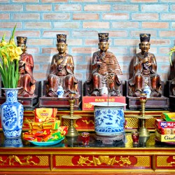 Hanoi altar with statues and offerings during local festival