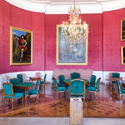 Chateau de Chambord interior with furniture and artwork on displ