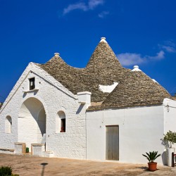 Apulia Puglia Italy. Alberobello. Trulli: traditional Apulian dry stone huts with a conical roof. Trullo Sovrano
