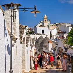 Apulia Puglia Italy. Alberobello. Trulli: traditional Apulian dry stone huts with a conical roof.