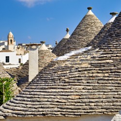 Apulia Puglia Italy. Alberobello. Trulli: traditional Apulian dry stone huts with a conical roof.