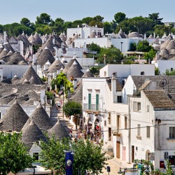 Apulia Puglia Italy. Alberobello. Trulli: traditional Apulian dry stone huts with a conical roof.