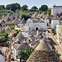 Apulia Puglia Italy. Alberobello. Trulli: traditional Apulian dry stone huts with a conical roof.