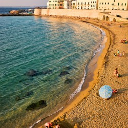 Salento. Apulia Puglia Italy. Gallipoli. People on the beach