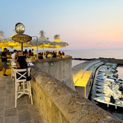 Gallipoli Puglia Salento Italy. Aperitif ay sunset at the town walls