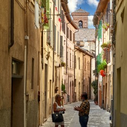 Foligno Umbria Italy. Talking in the alleys of the old town