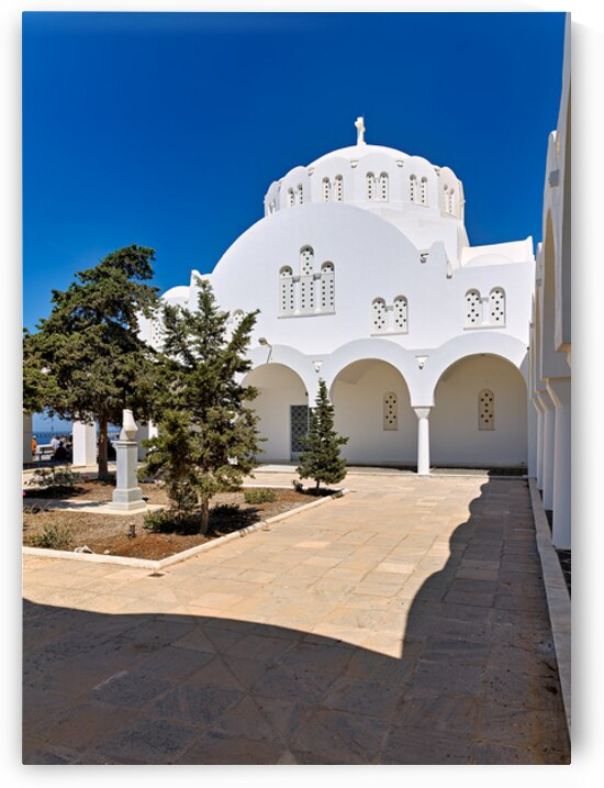 Beautiful white church green trees and blue sky. by Marco Brivio