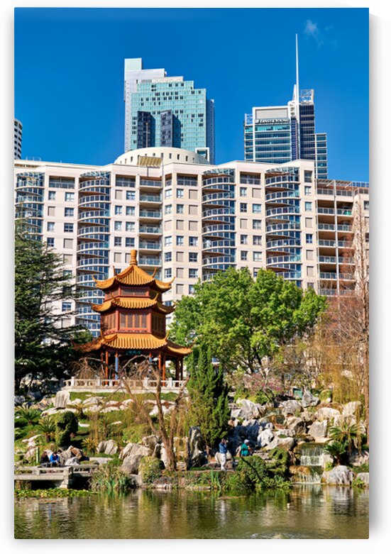 Traditional Chinese garden with modern skyscrapers in background by Marco Brivio