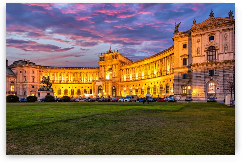 Illuminated Hofburg Palace in Vienna at sunset with vibrant sky. by Marco Brivio
