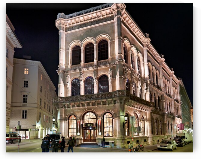 Viennas Cafe Central illuminated at night with police and peop by Marco Brivio