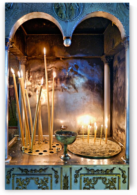 Votive candles lit inside Ekklisia Panagia Grigorousa in Athens  by Marco Brivio