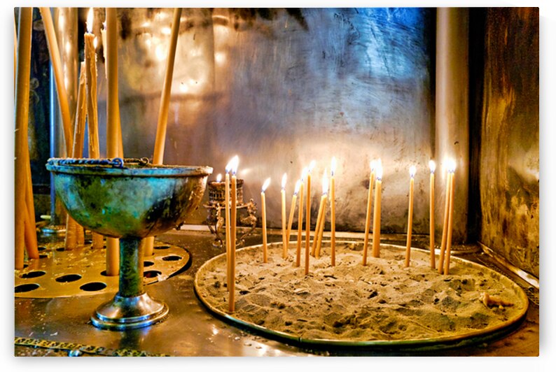 Votive candles lit inside Ekklisia Panagia Grigorousa in Athens  by Marco Brivio