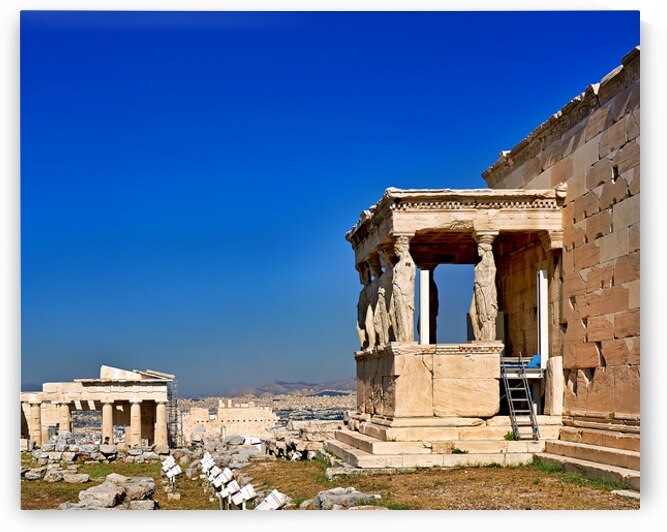 Erechtheion temple on Acropolis in Athens Greece under clear sky by Marco Brivio